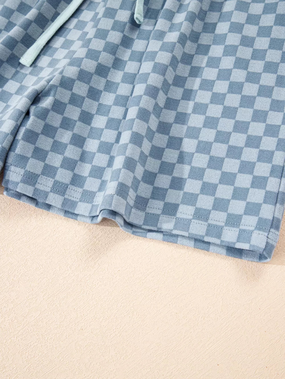 Light blue checkerboard loungewear shorts with drawstring detail