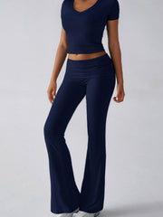 Dark Blue ribbed flare leg lounge pants with ruched waistband.