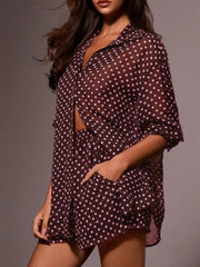 Burgundy polka dot sheer two-piece set with button-up shirt and shorts with pockets.
