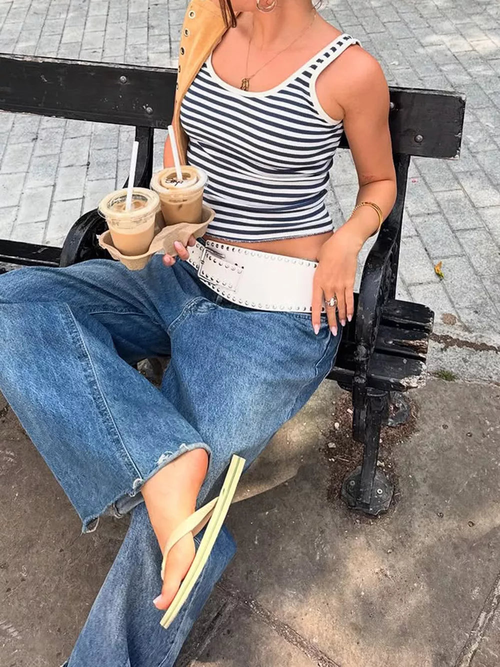 Ribbed striped scoop neck tank top with white trim detail.