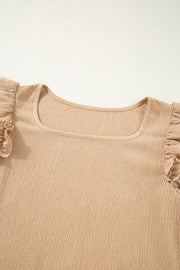 Tan textured square neck blouse with ruffled short sleeves