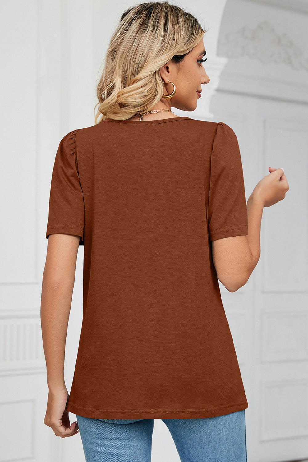 Caramel tee with square neck and sculpted short sleeves.