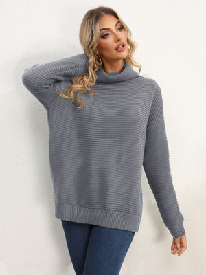 Dark Gray textured knit oversized turtleneck pullover sweater with ribbed details.