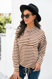 Chestnut striped relaxed fit hoodie with button neck and drawstring waist.