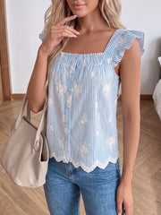 Blue striped peplum blouse with white embroidery, ruffles, and scalloped hem.