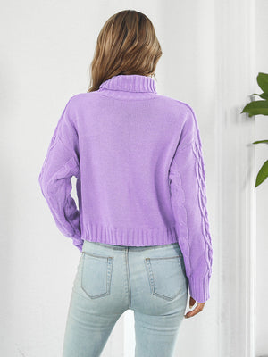 Lilac cable knit cropped turtleneck pullover sweater with braided sleeves.