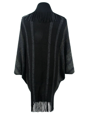 Black knit capelet with vertical metallic stripes and fringe detail at neckline and hem.