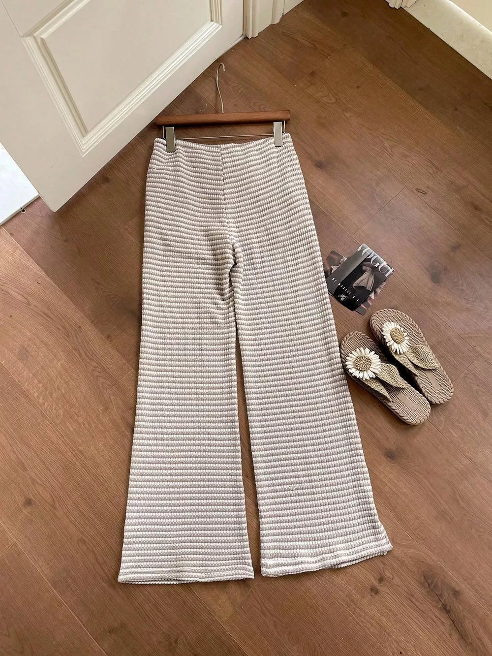 Maternity wide leg trousers with subtle stripe pattern in a knit fabric.