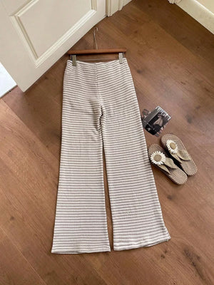 Maternity wide leg trousers with subtle stripe pattern in a knit fabric.