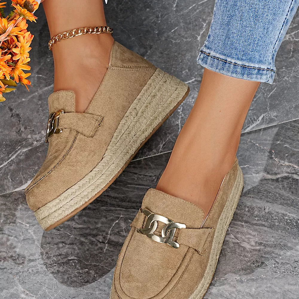 Chic brown round toe platform loafers with gold chain detail and espadrille sole.