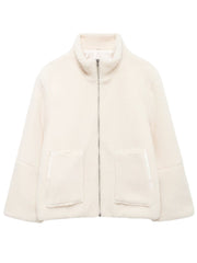 White sherpa jacket with stand collar, zip front, and two patch pockets.