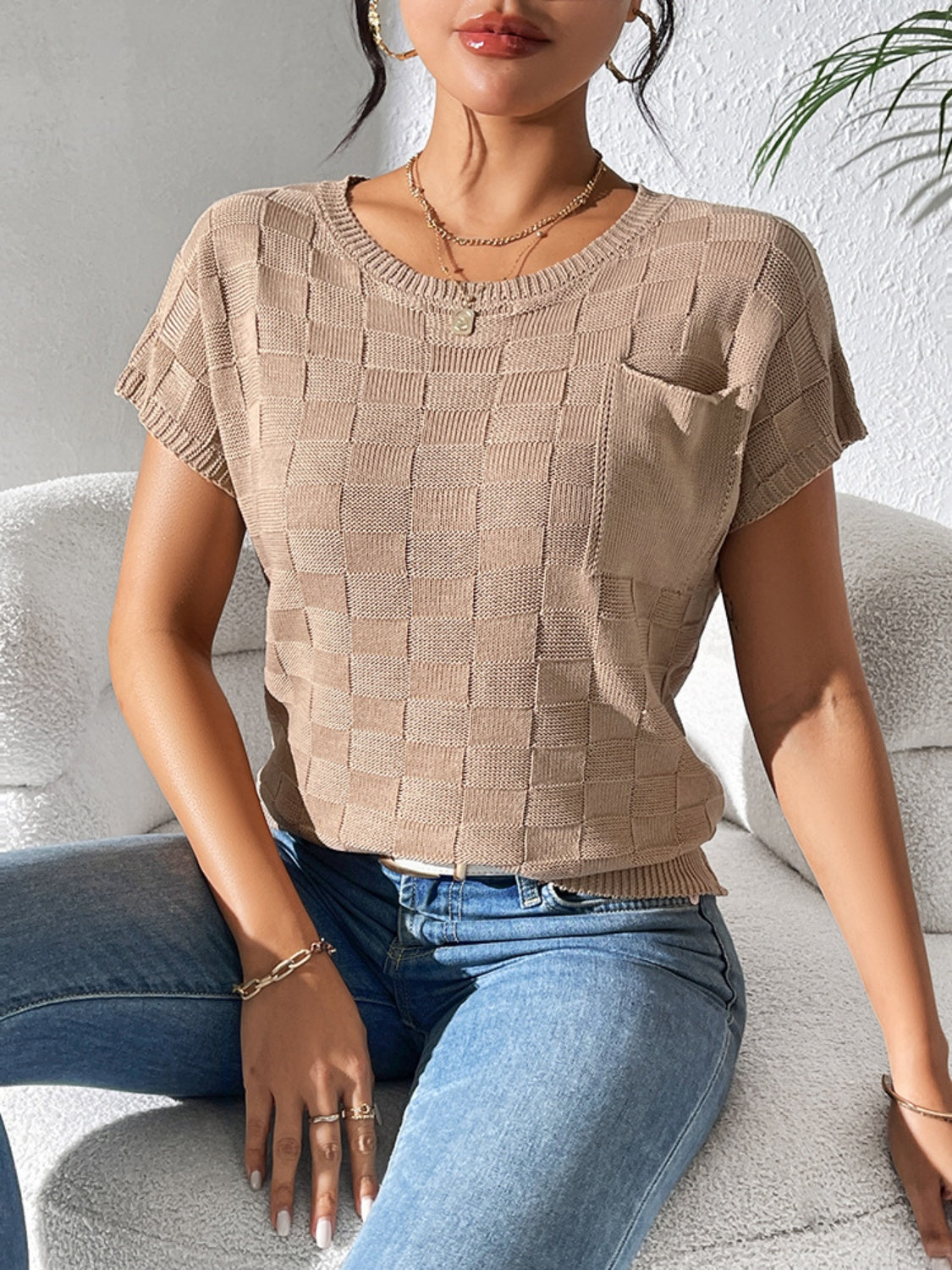 Camel textured check knit pocket tee with short sleeves and crew neck.