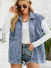 Relaxed-fit sleeveless denim vest in light blue with button-down front and chest pockets.