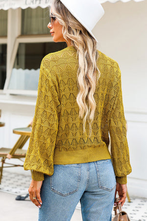 Openwork knit cardigan in Chartreuse with balloon sleeves and a buttoned front.