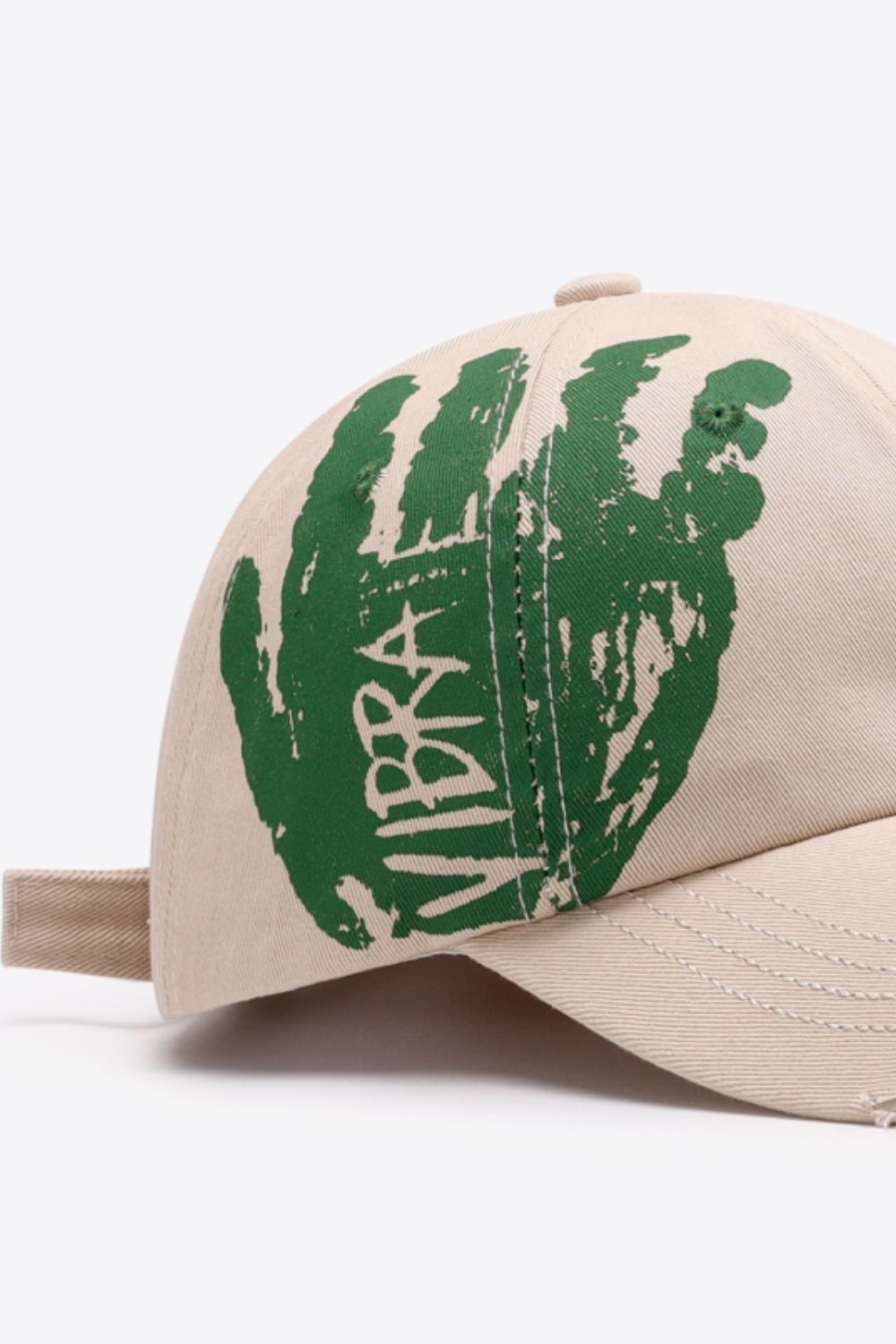 Sand baseball cap with green graffiti art and VIBRA text, adjustable strap