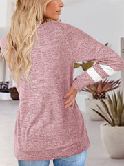 Dusty pink heathered raglan v-neck top with white varsity stripes on the sleeves.