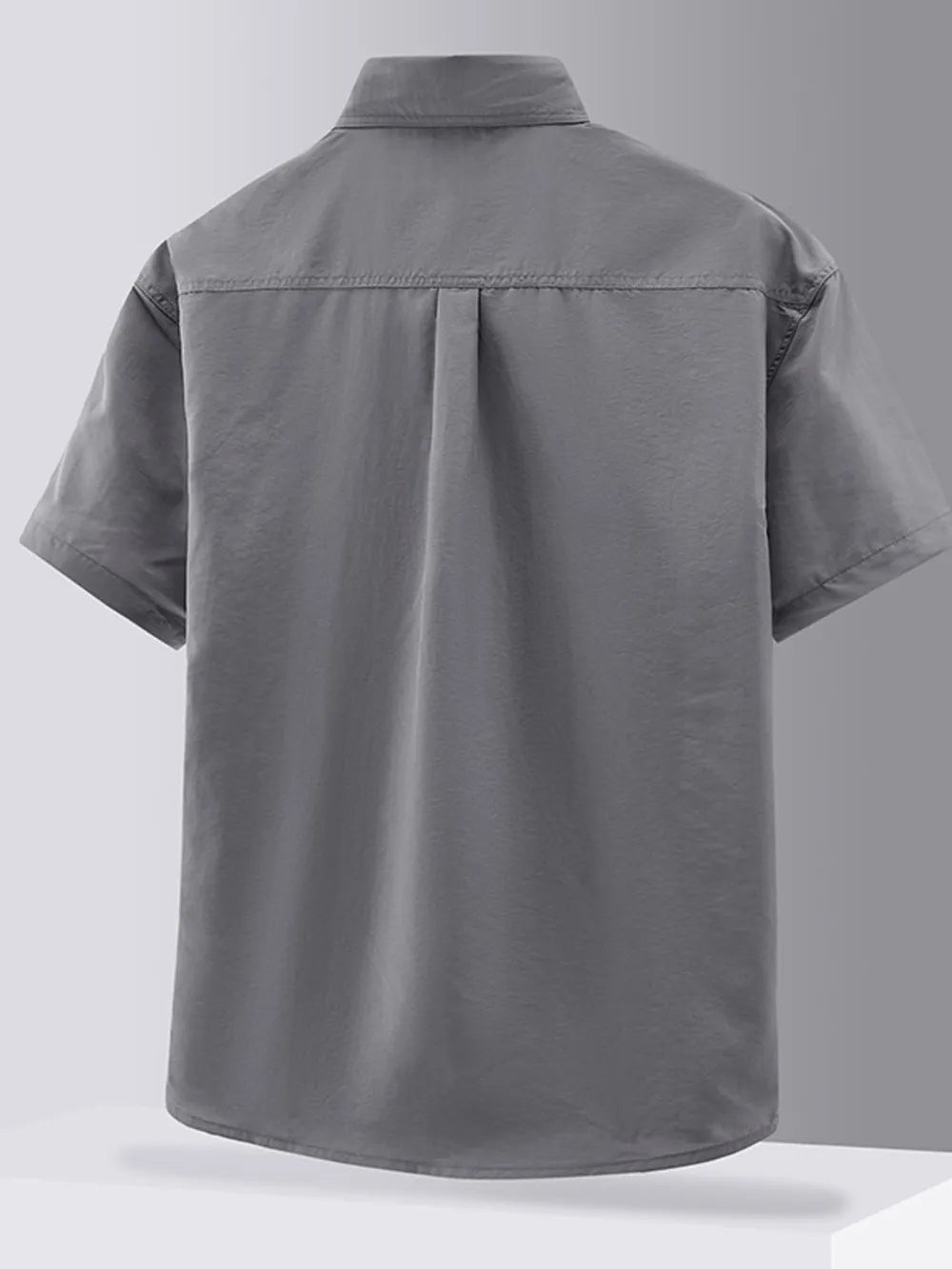 Grey short sleeve button-down shirt with back pleats and collar detail