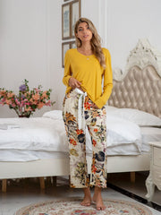 Botanical print lounge pants with tie waist in yellow.