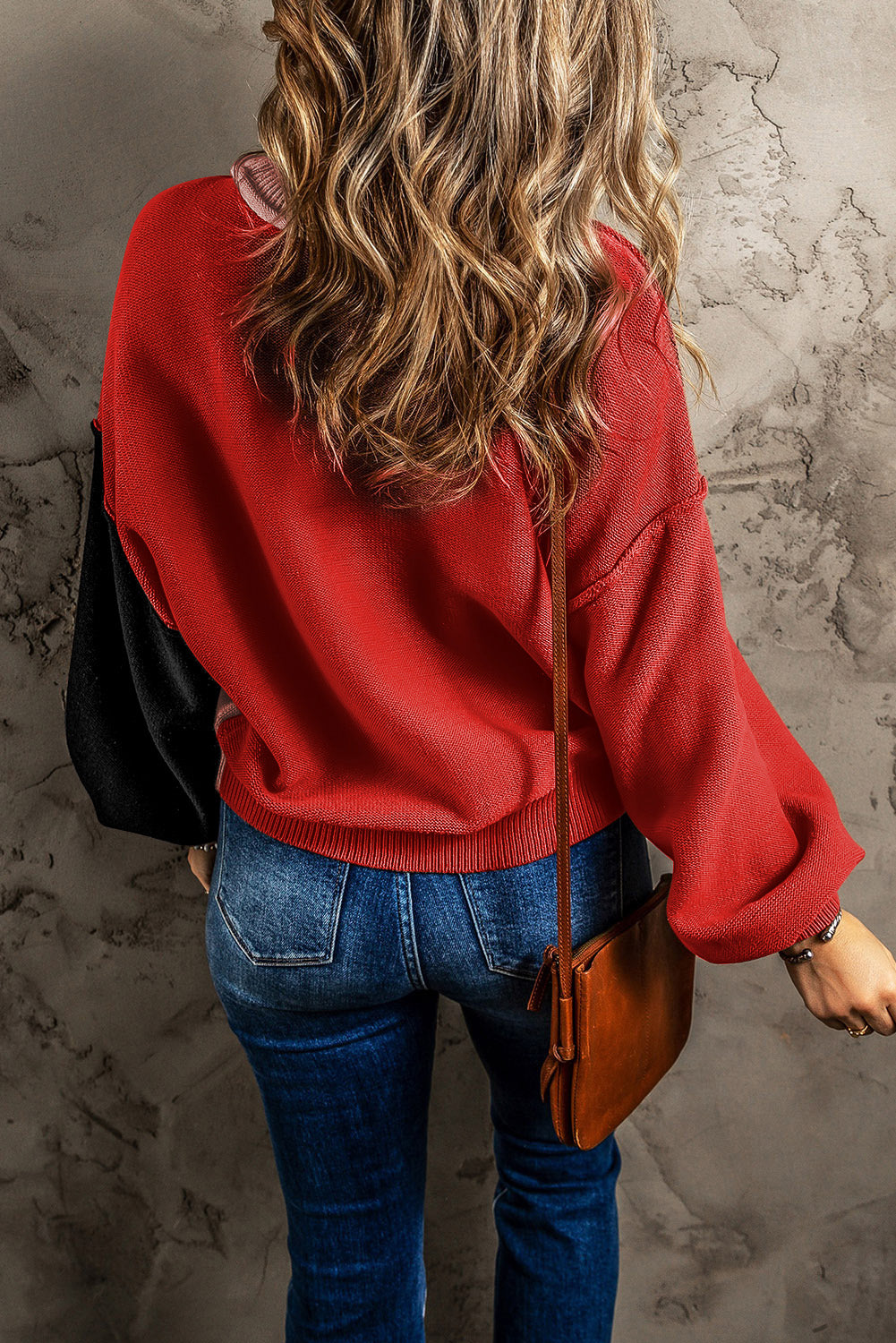 Chic Contrast Cozy Sweater in red with black balloon sleeves, crew neck, and casual acrylic knit.