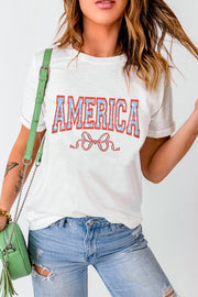 White graphic tee with Americana text and bow detail