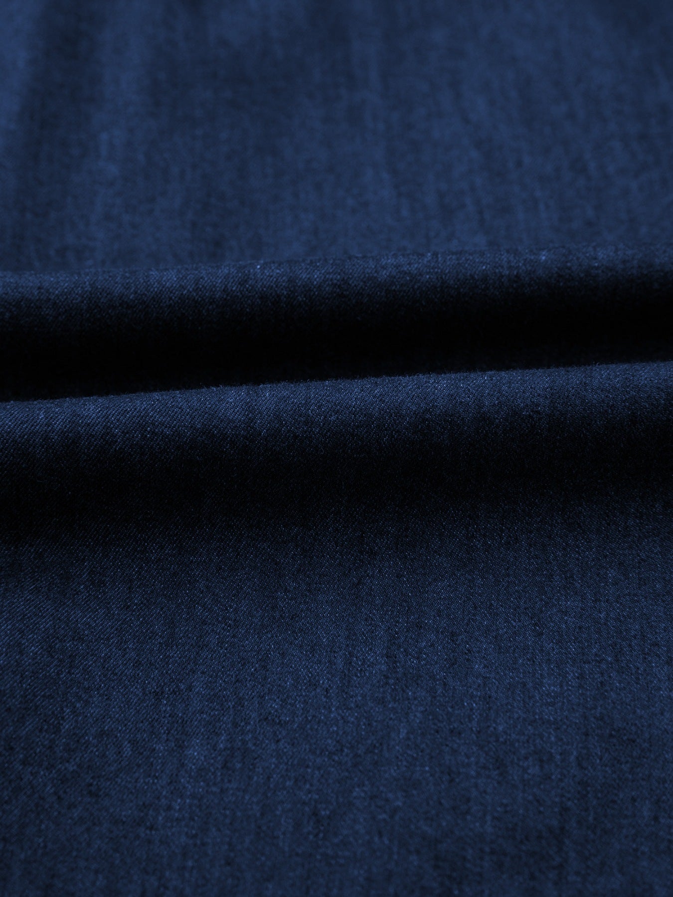 Button-down midi denim dress in navy blue cotton with a belt detail.