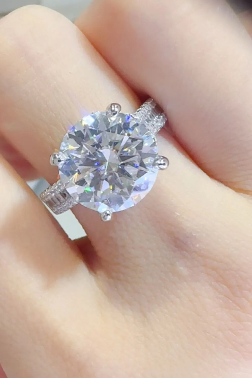 Silver moissanite crown ring with pavé band detail