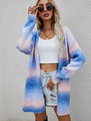 Longline knit cardigan with rainbow gradient in blue and blush pink, open front, long sleeves.