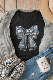 Black tee with sequined denim bow embellishment