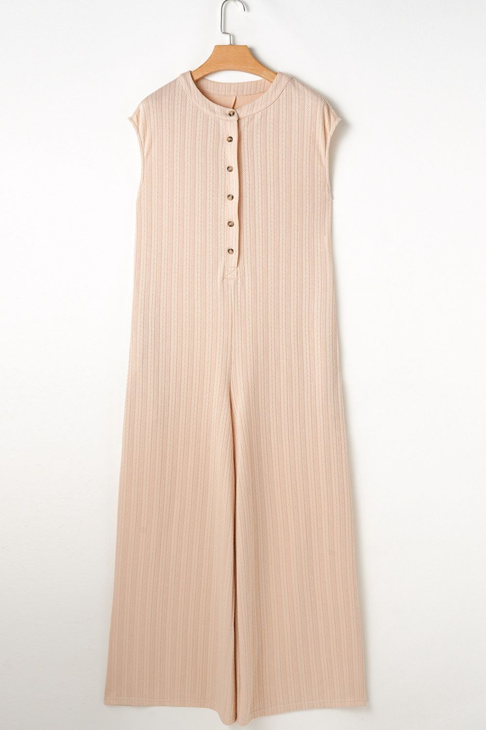 Textured ribbed sleeveless collar jumpsuit in eggshell with button detail