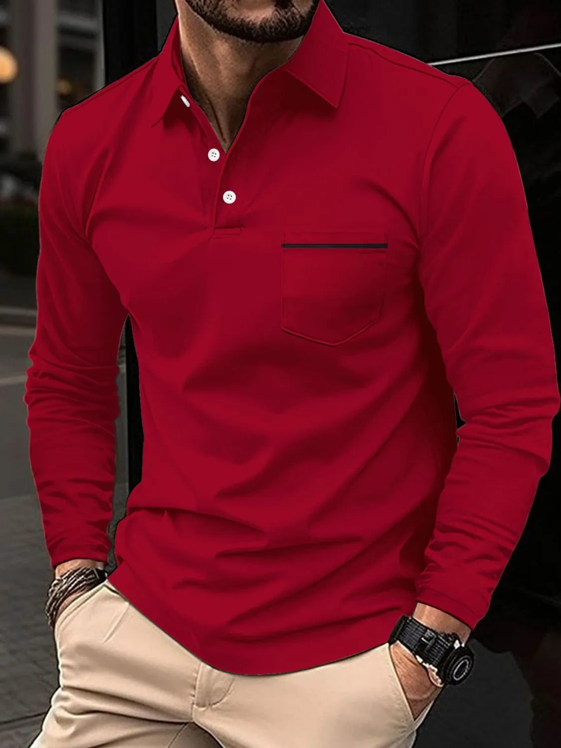 Burgundy long-sleeve polo shirt with chest pocket and black trim detail.