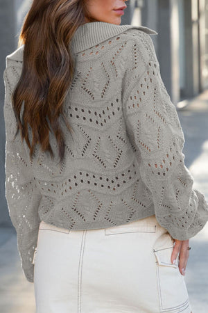 Gray openwork collar knit sweater with diamond pattern and long sleeves.