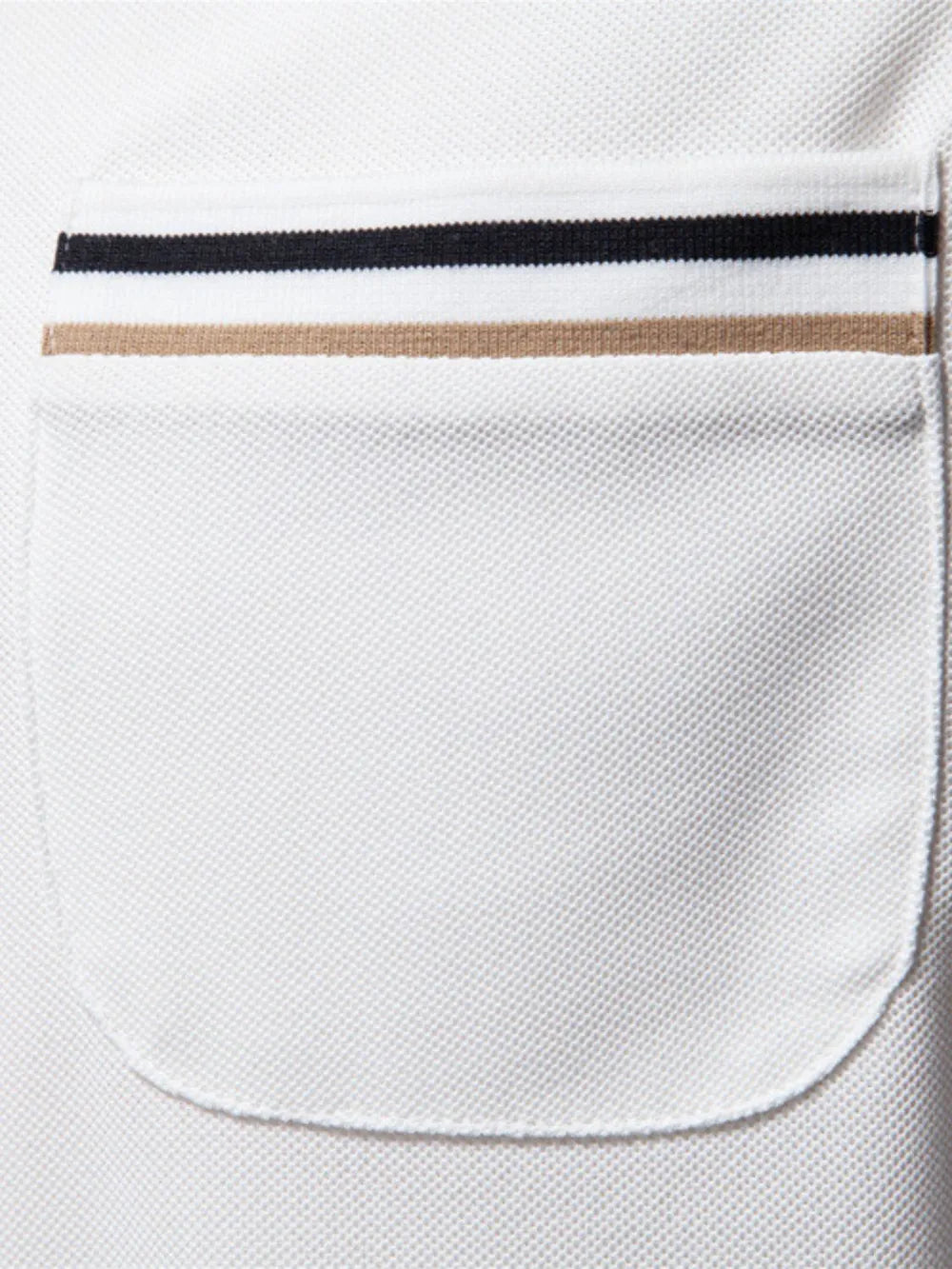 White polo shirt with textured fabric and contrast trim pocket detail