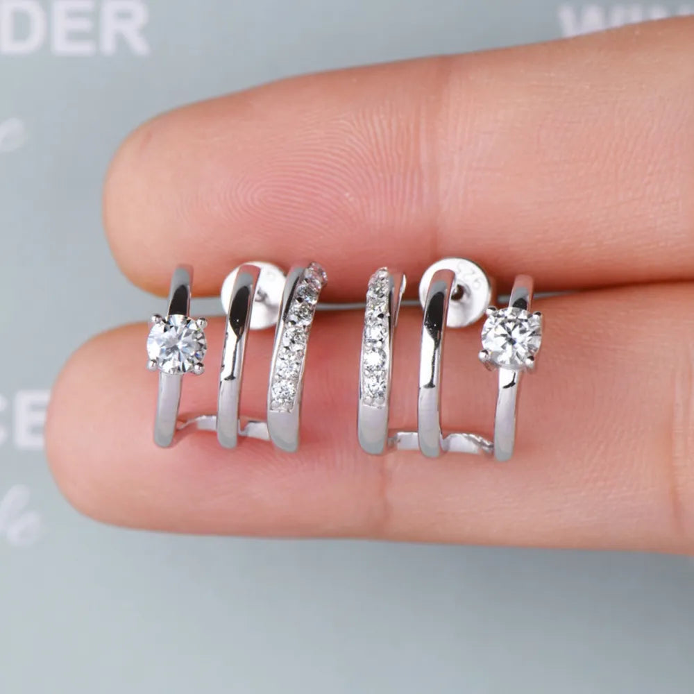 Triple-bar crystal stud earrings in silver with a D color grade diamond accent.