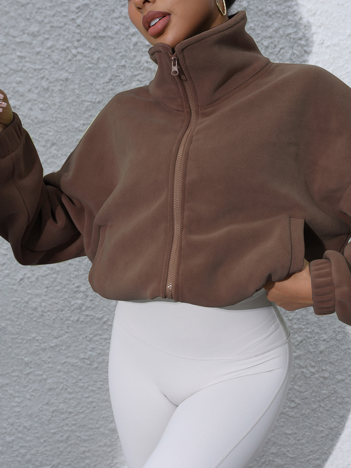 Coffee brown fleece cropped jacket with funnel neck and zip pockets