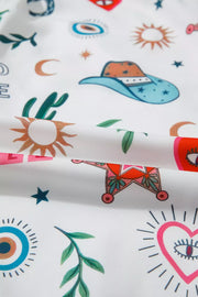 White polyester mini dress with cacti, cowboy hats, suns, moons, and hearts print.