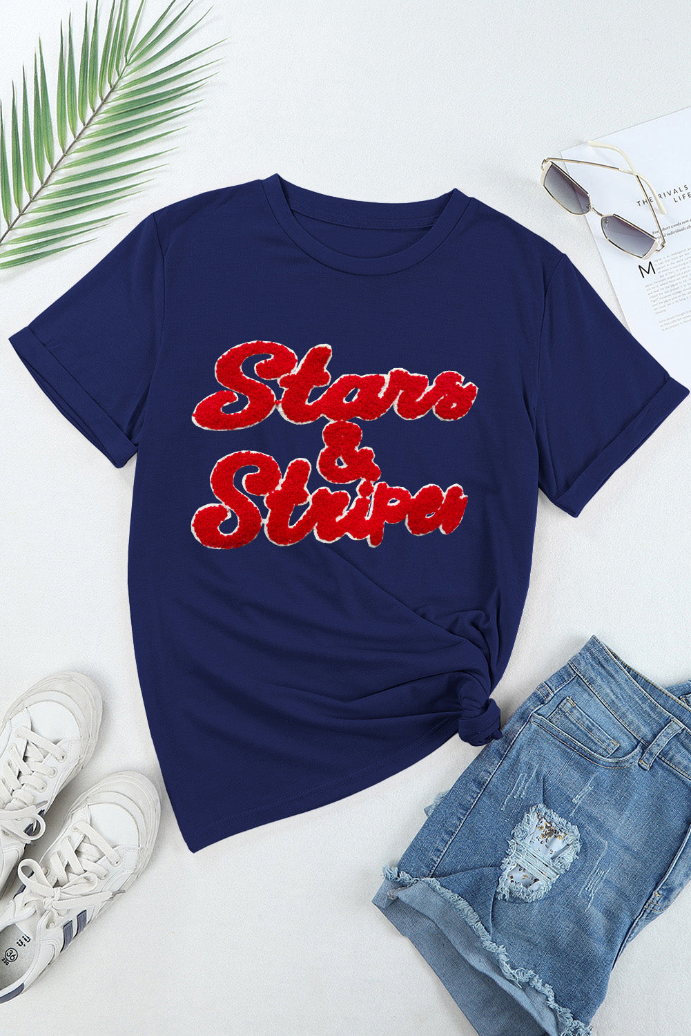 Dark blue cotton blend t-shirt with red chenille "Stars & Stripes" graphic, crew neck, short sleeves.