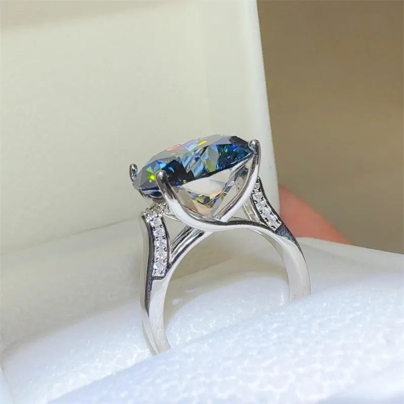 Silver ring with large celestial azure moissanite and diamond accents