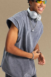 Acid wash gray boxy muscle tee with a relaxed fit and raw hem sleeves.