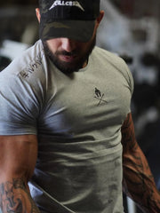 Spartan graphic muscle fit tee in gray with Japanese text detail on sleeve.