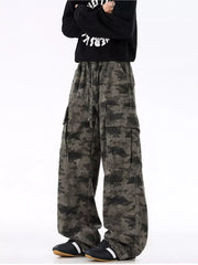 Urban camouflage cargo sweatpants with drawstring waist and multiple pockets.