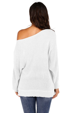 White off-shoulder batwing knit sweater with textured ribbing, shown from the back.