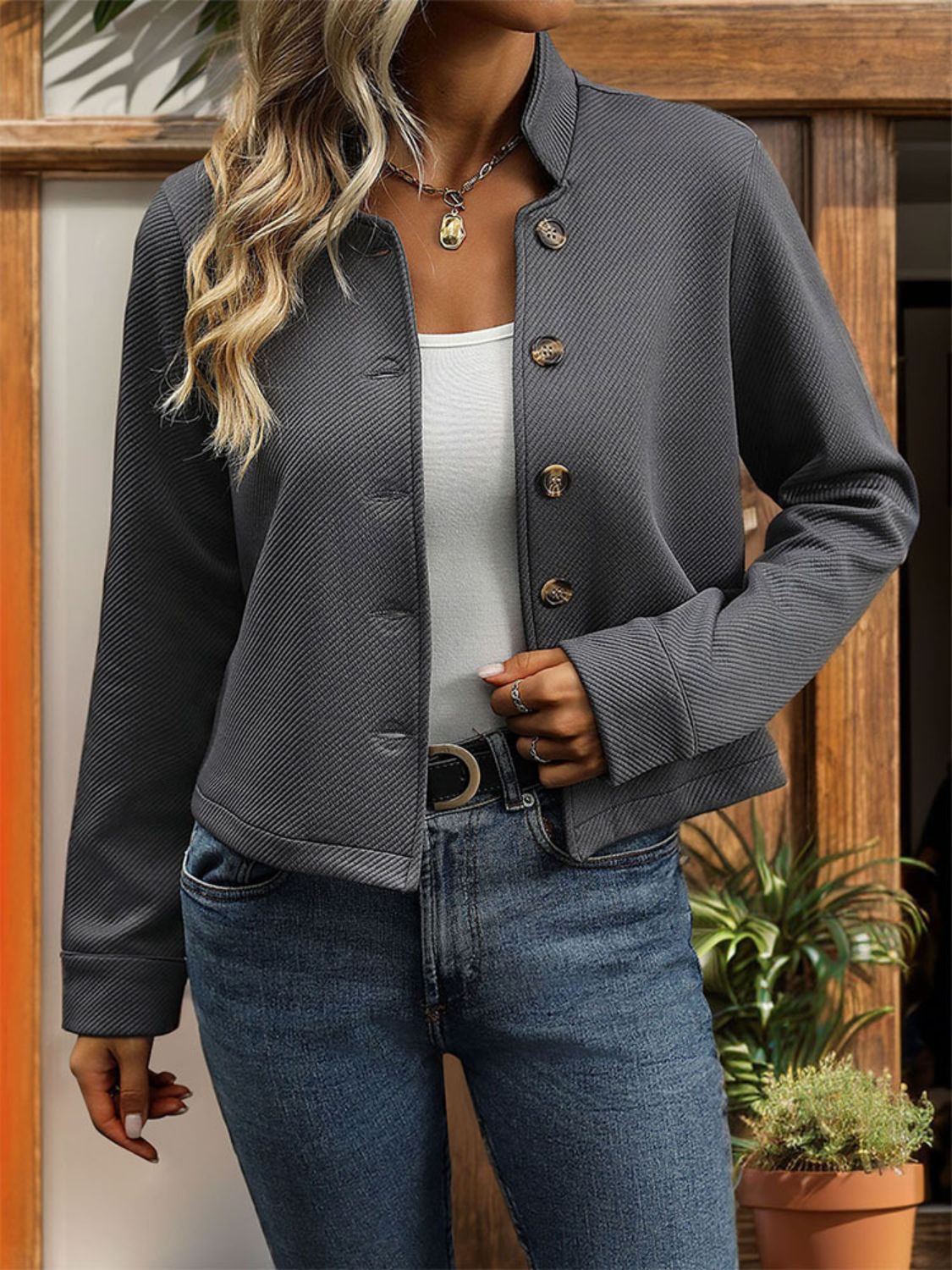 Dark gray ribbed stand-collar button-front blazer with a casual cut.
