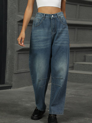Relaxed fit medium wash denim trousers with patchwork knee detail.