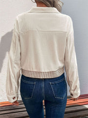 Beige corduroy jacket with houndstooth panel detail and button cuffs
