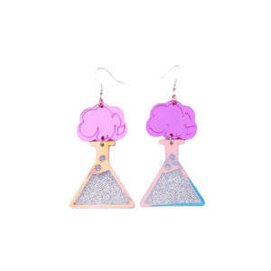 Fuchsia pink acrylic beaker dangle earrings with glitter detail and cloud tops.