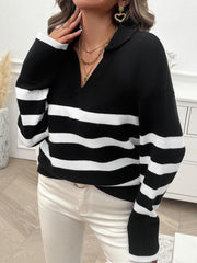 Black and white striped knit polo sweater with a v-neck and collar.