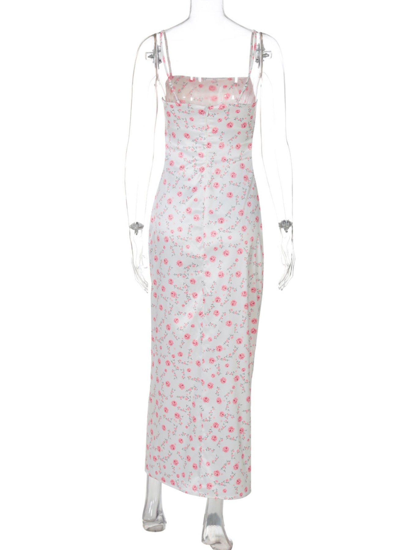 White midi dress with pink floral print, spaghetti straps, and square neckline.