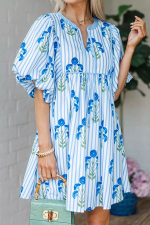 Floral stripe puff sleeve mini dress with blue floral print and adjustable drawstring waist.