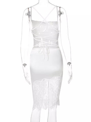 White satin cowl neck dress with lace trim and lace-up back detail.