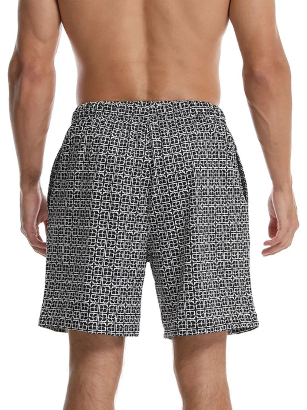 Geometric print boardshorts in black with a white pattern.